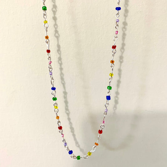 Beaded rainbow seed bead wire necklace.
