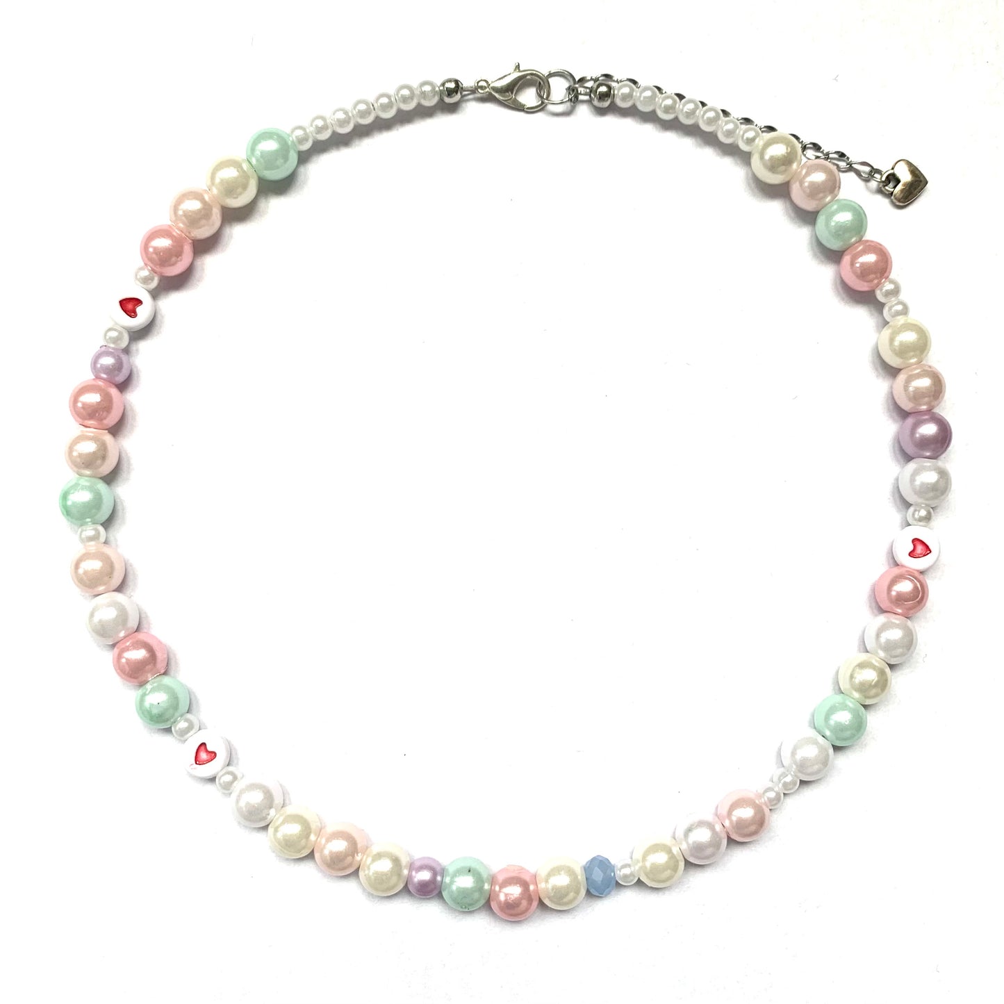 Pastel necklace with pink, white, beige, purple, and mint coloured pearls.